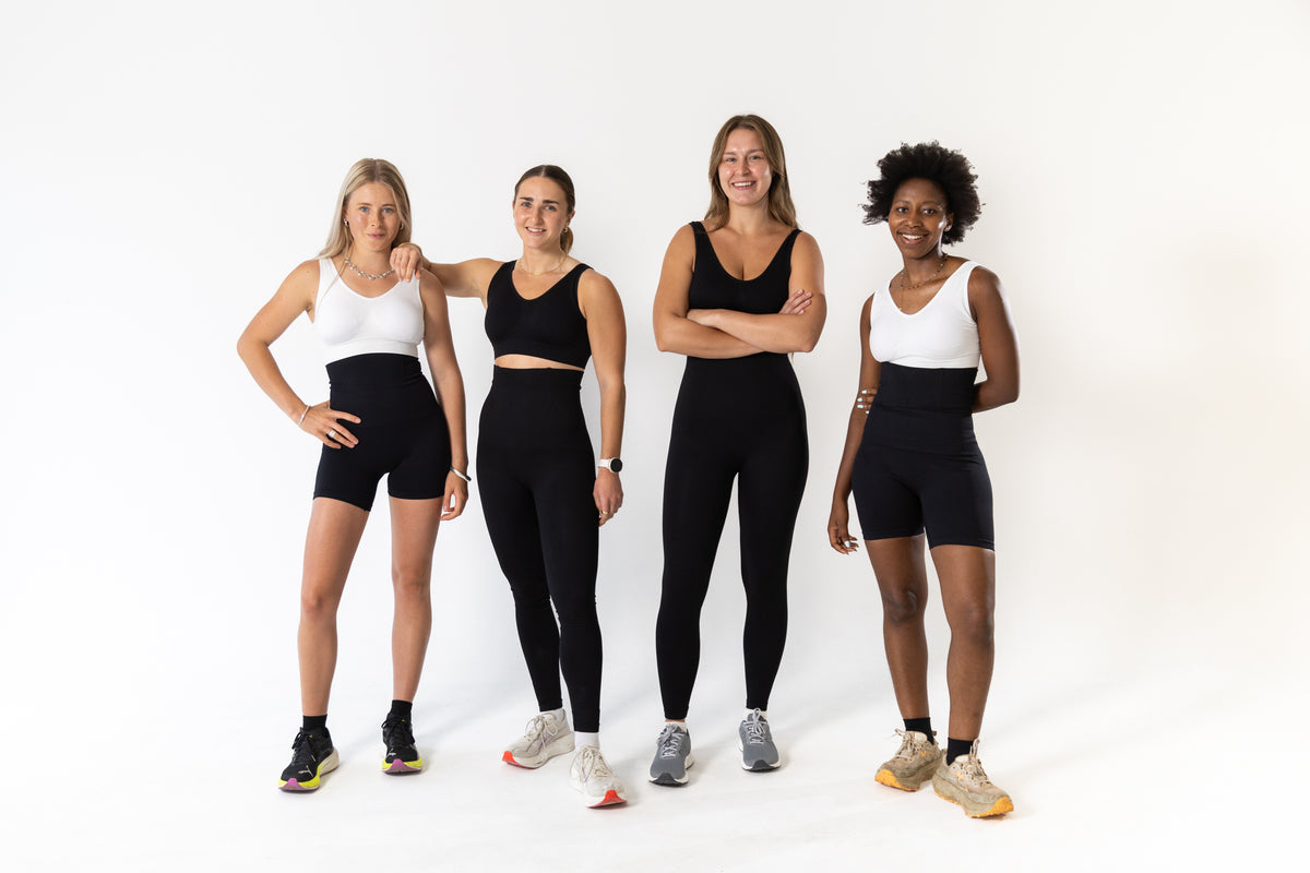 Women wearing KORFORM high-waisted compression leggings and shorts